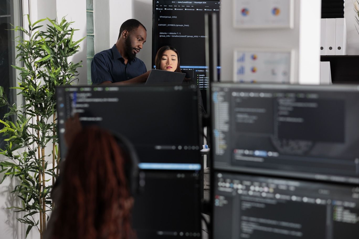 team-of-app-developers-looking-at-coding-algorithm-2025-02-17-08-38-57-utc.jpg